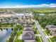 Overhead view displaying the homes, waterway, and neighborhood at 1078 Vinsetta Cir, Winter Garden, FL 34787