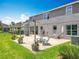 Expansive backyard features a covered patio, perfect for outdoor enjoyment and entertaining at 1078 Vinsetta Cir, Winter Garden, FL 34787
