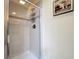 Modern bathroom shower with glass door and tile surround at 1078 Vinsetta Cir, Winter Garden, FL 34787
