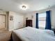 Bedroom with neutral carpet, double closet doors, and bright natural light at 1078 Vinsetta Cir, Winter Garden, FL 34787