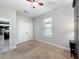Bedroom featuring neutral carpet, ceiling fan, and a double-door closet at 1078 Vinsetta Cir, Winter Garden, FL 34787