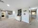 Inviting bonus room with coffee bar and decor, connecting hallway, and lots of open space at 1078 Vinsetta Cir, Winter Garden, FL 34787