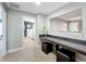 Hallway nook with a desk and stool sitting area at 1078 Vinsetta Cir, Winter Garden, FL 34787