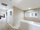 Second story hallway with a view into other rooms at 1078 Vinsetta Cir, Winter Garden, FL 34787