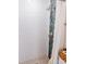 Bathroom featuring a tiled shower with glass accents, white shower curtain, and neutral finishes at 110 S Primrose Dr, Orlando, FL 32803