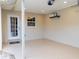 Clean and spacious garage with epoxy floors, utility door, storage, and ample lighting at 110 S Primrose Dr, Orlando, FL 32803