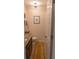 Stylish powder room with granite countertop, decorative mirror, and tile flooring at 110 S Primrose Dr, Orlando, FL 32803