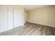 Empty bedroom with a closet and an open door at 1139 Humphrey Blvd, Deltona, FL 32738
