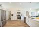 Clean, bright kitchen with stainless steel appliances and white cabinets at 1139 Humphrey Blvd, Deltona, FL 32738