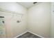 Laundry room offers overhead rack and wash/dryer hookups at 1139 Humphrey Blvd, Deltona, FL 32738