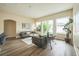 Bright living room featuring hardwood floors, neutral walls, and comfortable seating at 1139 Humphrey Blvd, Deltona, FL 32738