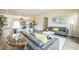 Comfortable living room area open to the kitchen with light colored walls at 1139 Humphrey Blvd, Deltona, FL 32738