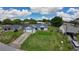 A residential home featuring a well-kept lawn and landscaping, in a Gathering-friendly neighborhood at 119 Ridgecrest Dr, Eustis, FL 32726