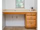 Close up shot of desk area with functional drawers and electrical outlets at 12107 Poppy Field Ln # 105, Orlando, FL 32837