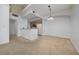 Spacious living room features vaulted ceilings, neutral paint, and open-concept design at 12107 Poppy Field Ln # 105, Orlando, FL 32837