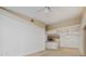 Spacious living room featuring vaulted ceilings, neutral paint, and open-concept design at 12107 Poppy Field Ln # 105, Orlando, FL 32837