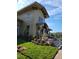 Beautifully landscaped community building with stone accents and elegant exterior at 1325 Rotonda Pt # 117, Lake Mary, FL 32746