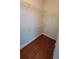 Walk-in closet with wood floor and wire shelving at 1325 Rotonda Pt # 117, Lake Mary, FL 32746