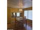 Inviting dining room with stylish lighting and comfortable seating at 138 Maple Dr, Debary, FL 32713