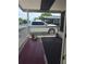 A cozy porch with brick accents and a view of the neighborhood at 138 Maple Dr, Debary, FL 32713