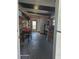 A room with a workbench, shelves, and exterior access at 138 Maple Dr, Debary, FL 32713