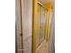The shower is enclosed with glass doors, complemented by convenient storage shelves at 138 Maple Dr, Debary, FL 32713