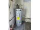 This area features a water heater on a painted cement floor at 138 Maple Dr, Debary, FL 32713