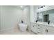 Bright bathroom boasts a modern soaking tub, double vanity, and elegant fixtures for a spa-like experience at 14957 Sw 63Rd Court Rd, Ocala, FL 34473