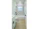 Bathroom featuring a shower-tub combo with sleek fixtures, a white vanity, and a modern design at 14957 Sw 63Rd Court Rd, Ocala, FL 34473