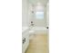 Bright bathroom features a shower over tub combination with stylish black hardware and neutral toned walls at 14957 Sw 63Rd Court Rd, Ocala, FL 34473