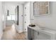Bright hallway featuring modern decor, leading to the main living area with gorgeous floors at 150 E Robinson St # 2812, Orlando, FL 32801
