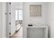 Bright hallway leading to a bedroom with a city view at 150 E Robinson St # 2812, Orlando, FL 32801