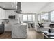 Open-concept living space with modern kitchen, dining area, and comfortable living room at 150 E Robinson St # 2812, Orlando, FL 32801