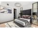 Bedroom featuring luxurious textures, city views and ample closet space at 150 E Robinson St # 2812, Orlando, FL 32801