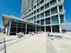 Building exterior with a rooftop patio area offering ample seating and modern design at 150 E Robinson St # 3408, Orlando, FL 32801