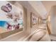 Elegant condominium hallway featuring artwork and designer lighting at 150 E Robinson St # 3408, Orlando, FL 32801