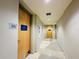 Hallway view with directional signs to Media Center and Vue Cafe at 150 E Robinson St # 3408, Orlando, FL 32801