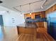 Spacious kitchen with island, stainless steel appliances, and modern lighting at 150 E Robinson St # 3408, Orlando, FL 32801