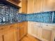 Kitchen with granite countertops, stylish backsplash, and stainless steel sink at 150 E Robinson St # 3408, Orlando, FL 32801