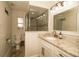 Well-lit bathroom features a glass-enclosed shower, modern vanity, and stylish fixtures at 1529 Glastonberry Rd, Maitland, FL 32751