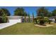 A quaint one-story home enhanced by a lush lawn and mature landscaping at 1529 Glastonberry Rd, Maitland, FL 32751