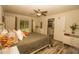 Inviting bedroom with wood-look floors, pool view, and ensuite bathroom access at 1529 Glastonberry Rd, Maitland, FL 32751