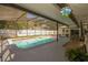 Inviting pool area with a large screened enclosure and patio furniture at 1529 Glastonberry Rd, Maitland, FL 32751