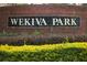 Community entrance to Wekiva Park with the community name on a brick sign at 1645 Boulder Creek Ct, Apopka, FL 32712