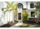 Picture of the front door of a well-maintained two-story home with landscaped front yard at 1645 Boulder Creek Ct, Apopka, FL 32712