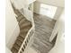 Spacious home featuring a staircase leading to an upstairs room with wood-look floors at 1645 Boulder Creek Ct, Apopka, FL 32712