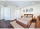 This bedroom has a wooden bed frame, carpet, recessed lights, and a double closet at 1772 Garden Sage Dr, Oviedo, FL 32765
