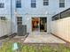 Back patio with sliding glass doors at 1772 Garden Sage Dr, Oviedo, FL 32765