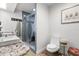 Well appointed bathroom with a glass enclosed shower, double sinks, and updated fixtures at 2105 Fosgate Dr, Winter Park, FL 32789
