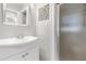 Functional bathroom featuring a sleek vanity, and a glass-enclosed shower at 2105 Fosgate Dr, Winter Park, FL 32789